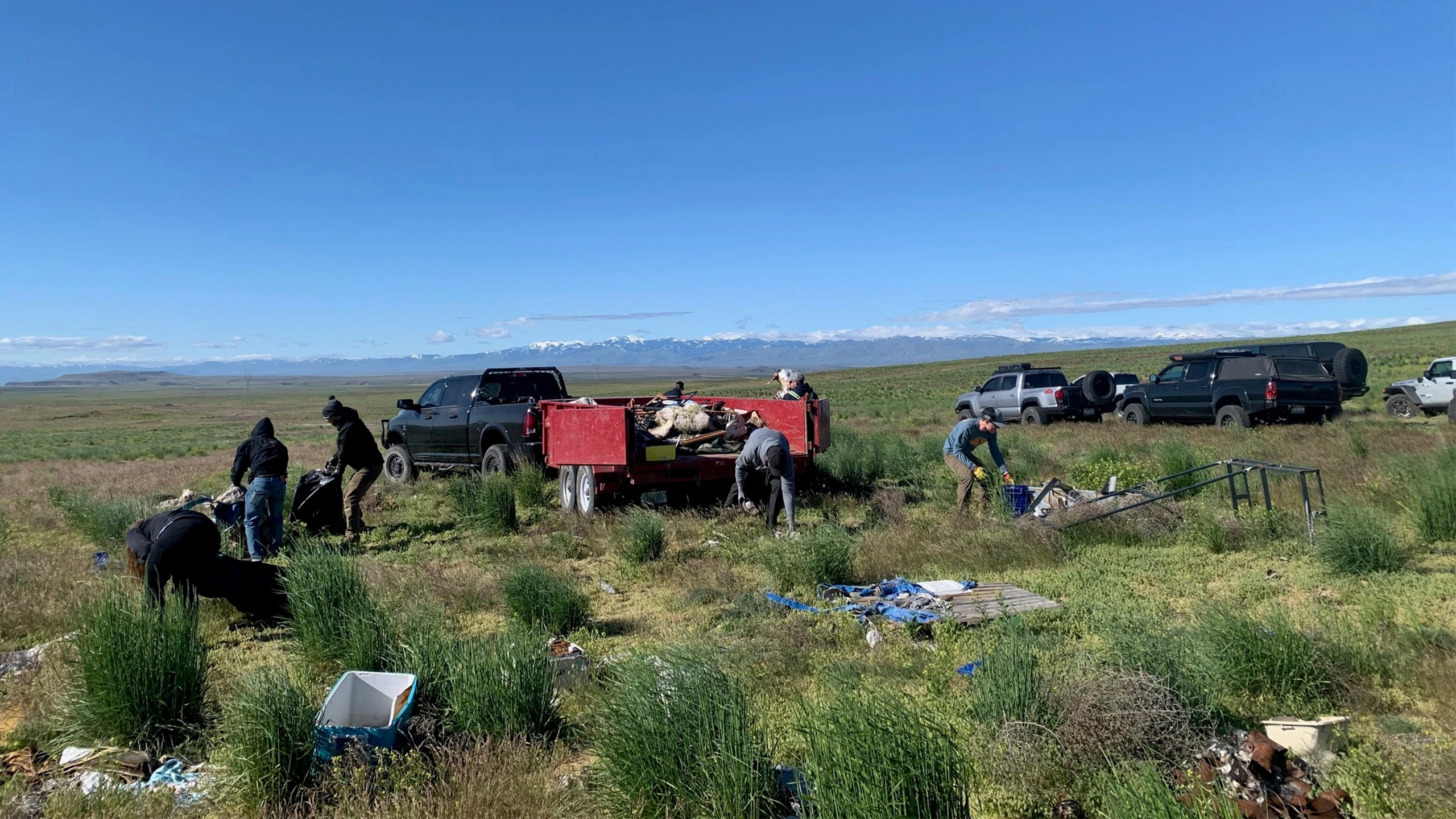 Volunteers clean up trash at Initial Point