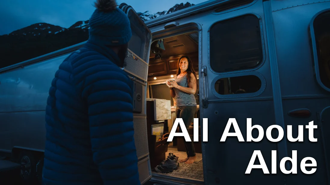 man opening door to RV with text overlay "All About Alde"