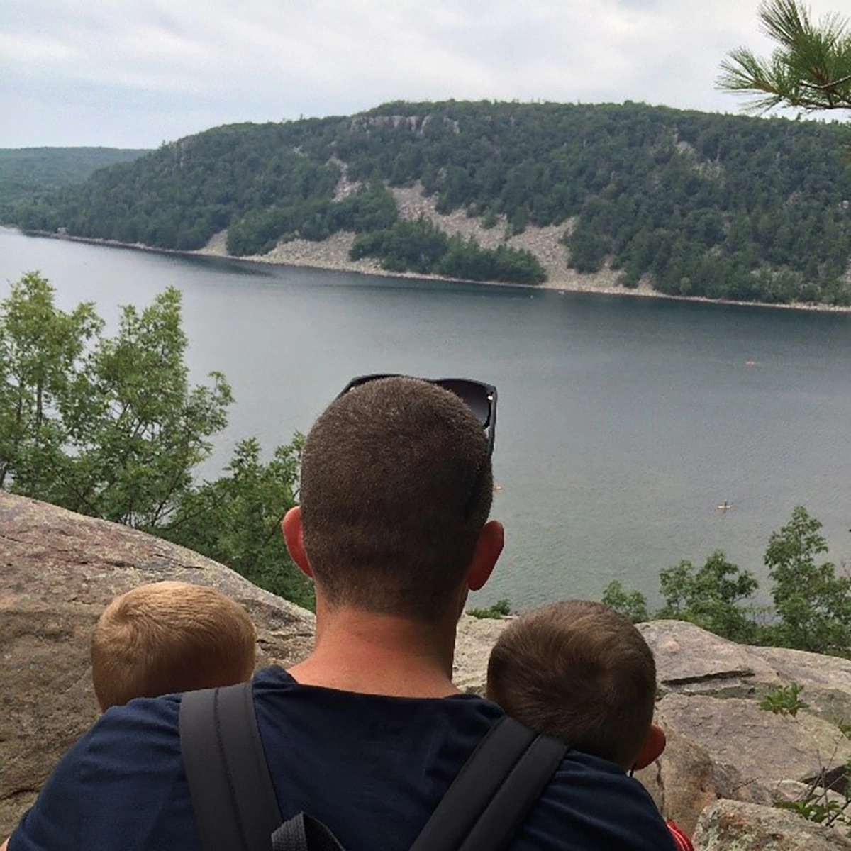 father and kids on mountain
