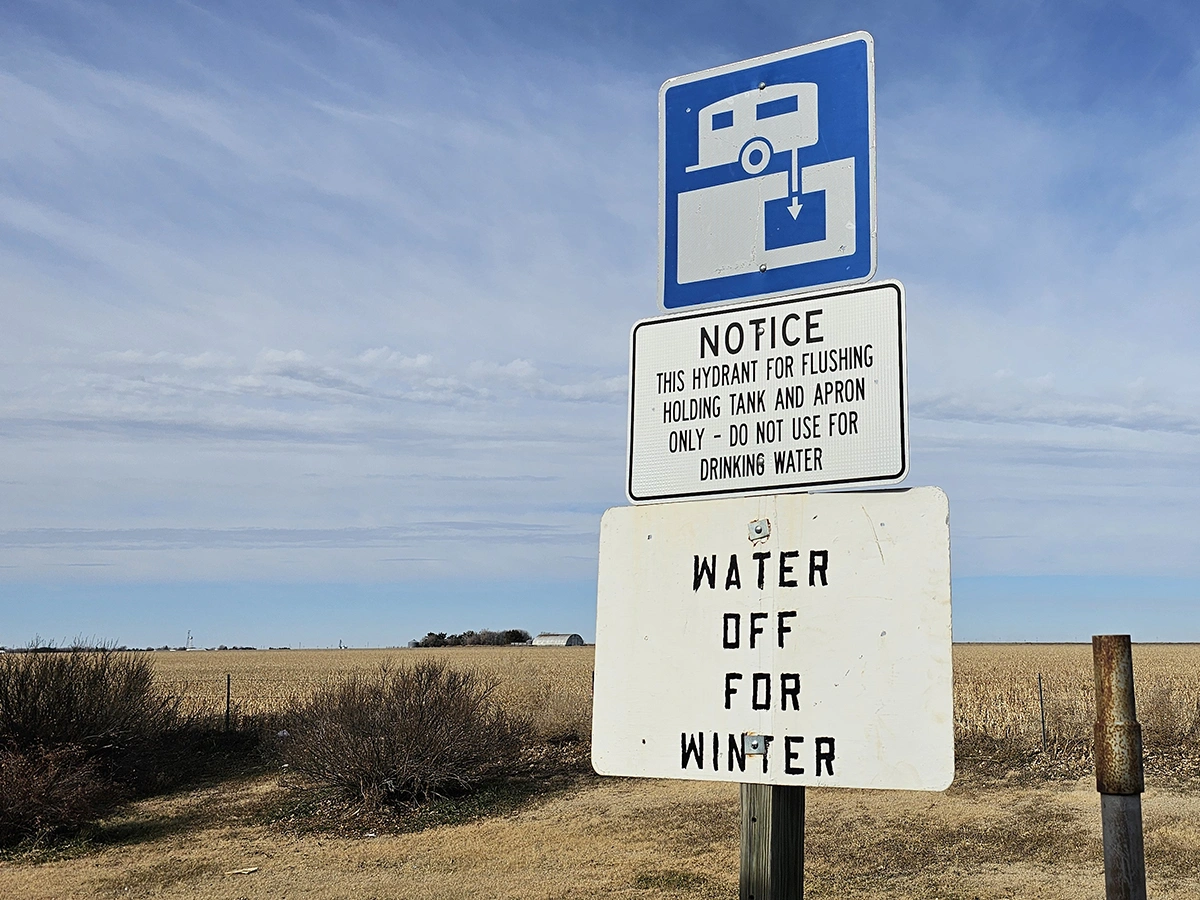 sign saying water is off for winter